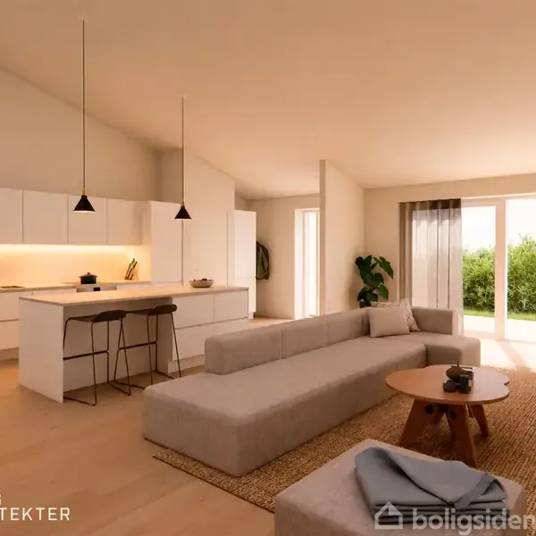 Moderne stue og køkken i åben plan; sofa og bord i forgrunden, køkkenø med stole i baggrunden; store vinduer slipper lys ind. Tekst: "Vang Arkitekter".