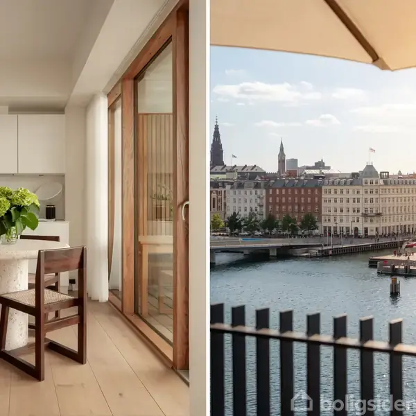 Et moderne køkken med træstole og et rundt bord, dekoreret med grønne blomster, står ved siden af store vinduer. Udenfor er der udsigt over en by ved en flod.