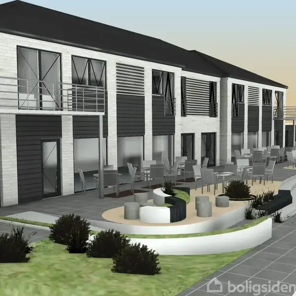 Et rækkehuskompleks med balkoner og store vinduer ligger i et moderne, velplejet udendørsområde med grønne buske. Stier og terrasser er indrettet til afslapning og socialt samvær.