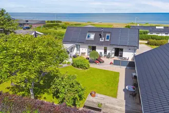 Fritidshus på Nordvangsvej 25, Skovgårde Strand, 8961 Allingåbro