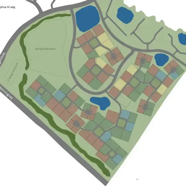 Kort over boligområde med huse markeret i forskellige farver. Veje opført med teksten "Niels Ørgaards Vej" og "Kærengen." Området inkluderer flere grønne parker og små blå søer.