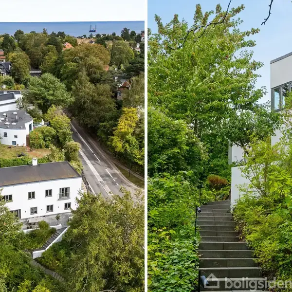 To hvide bygninger omgivet af frodig vegetation; den ene langs en skovvej, den anden ved en trappe op ad en grøn skråning med havudsigt i baggrunden.