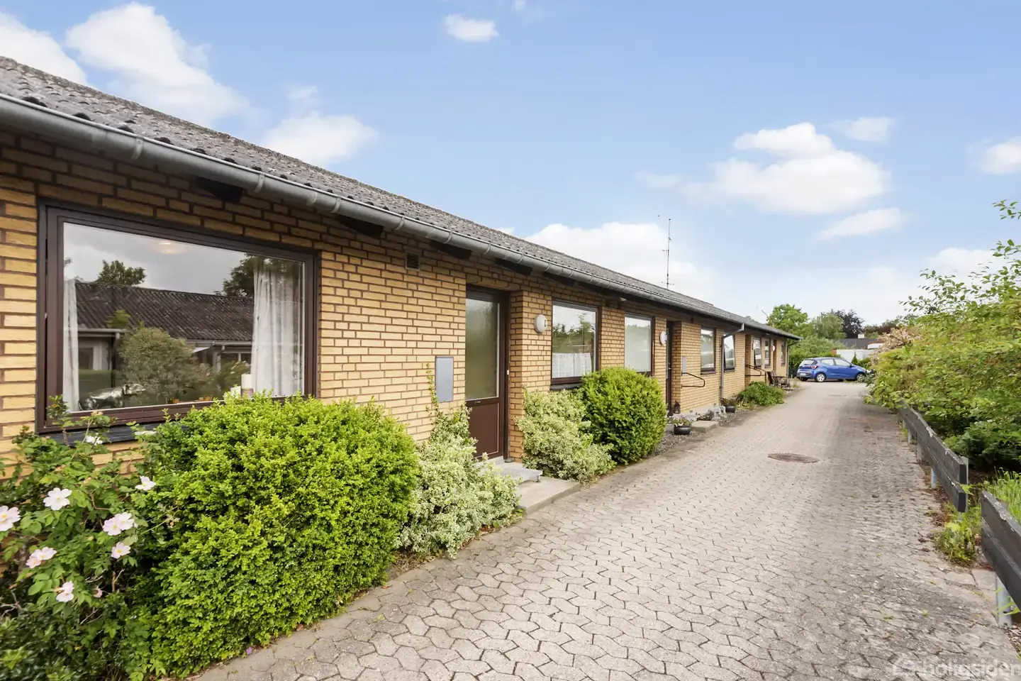 Velindrettet rækkehus med vestvendt terrasse i rolige Store Heddinge