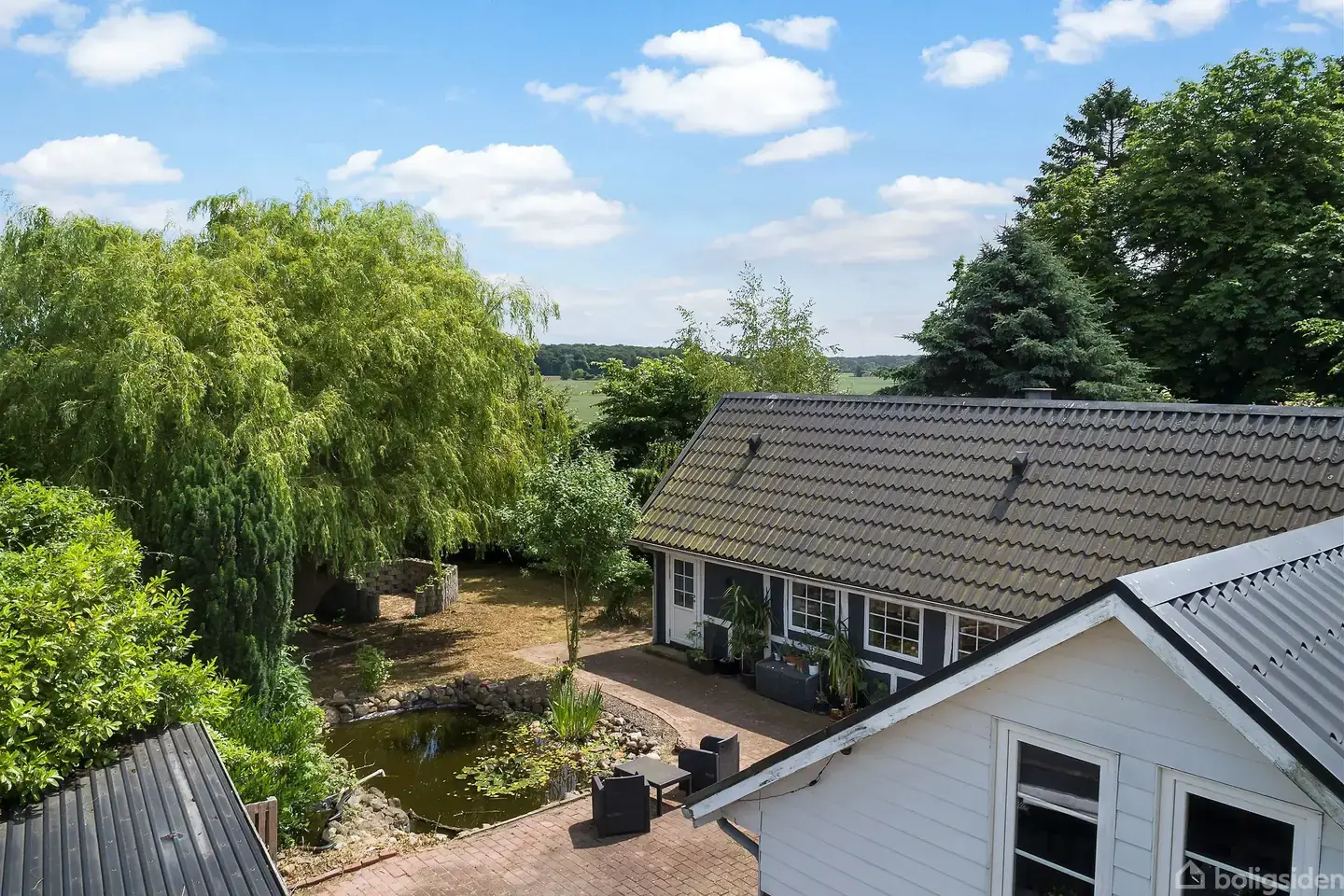 Hyggelig villaoase i Nørreballe med stor have og charmerende dam - Visning 2