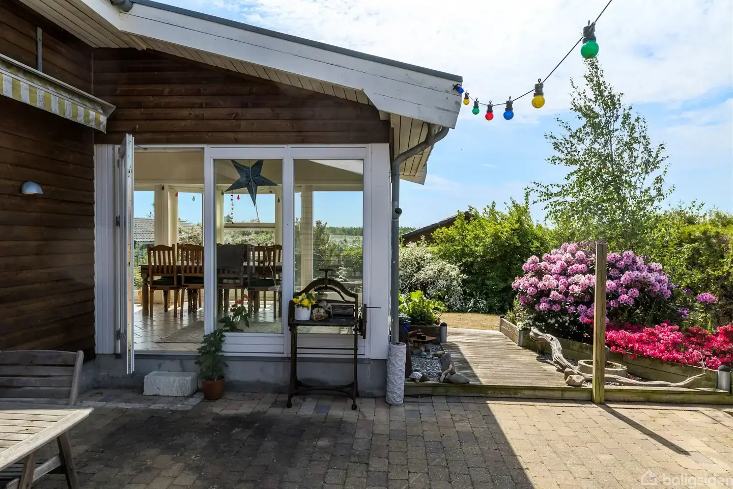 Kolonihavedrømmen lever her i dette kvalitetshus med loft til kip og gulvvarme