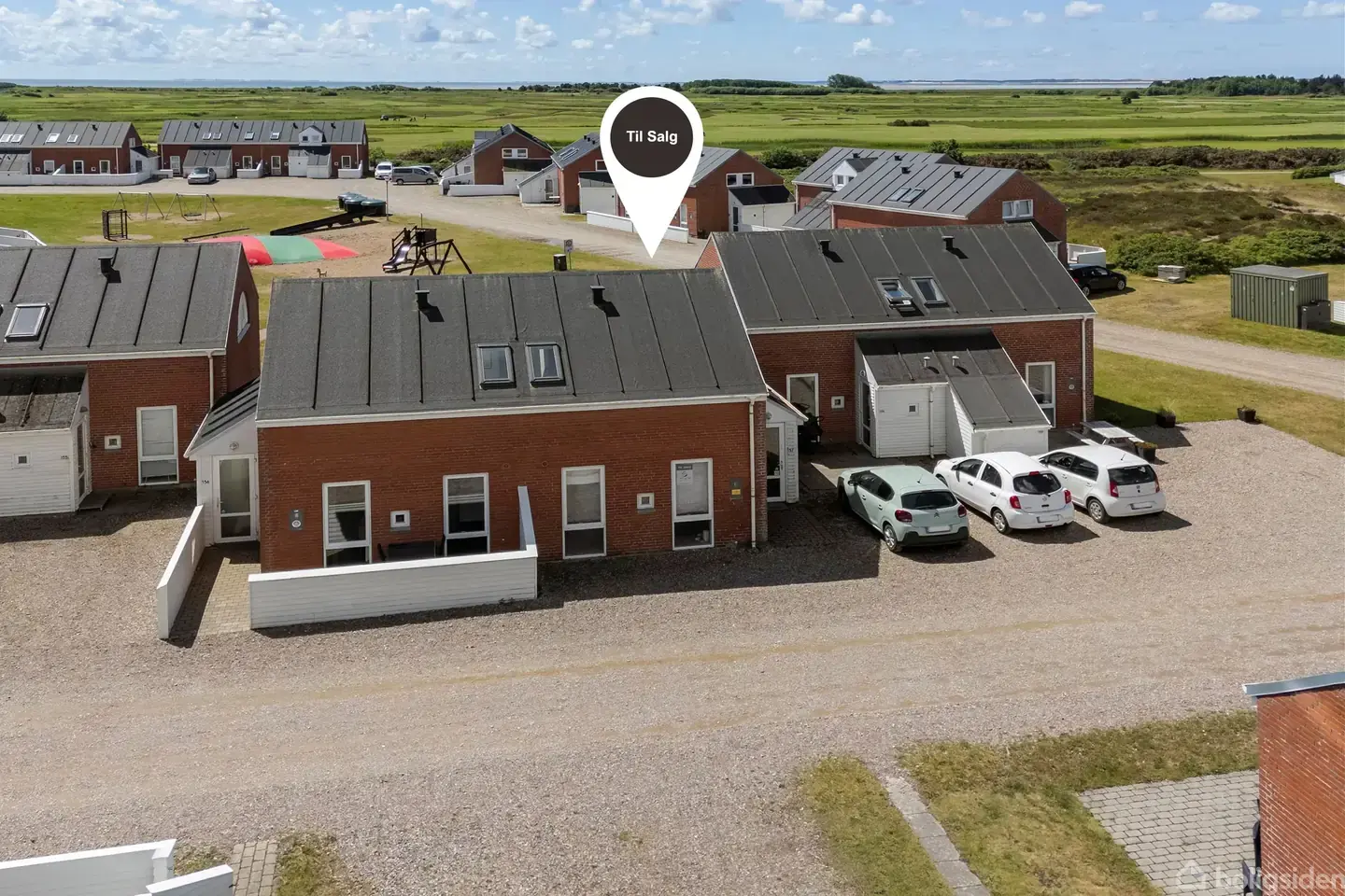 Rim-hus centralt beliggende i resortet.