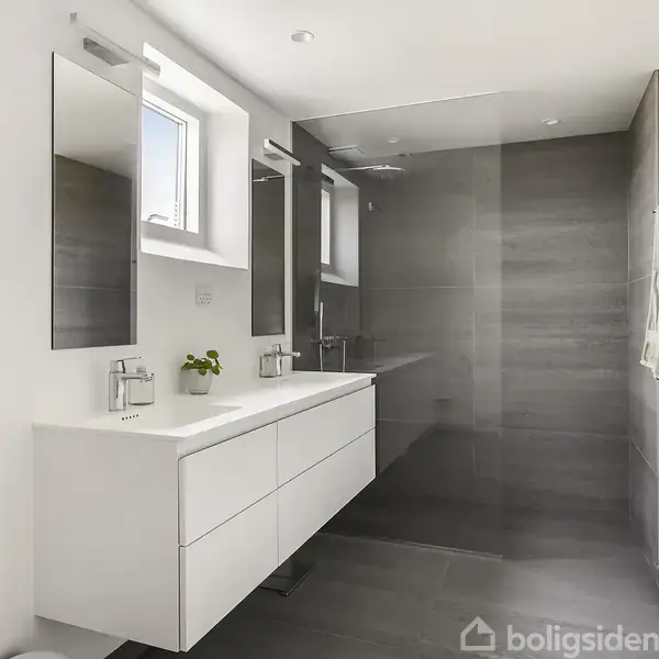 Et moderne badeværelse med dobbelte håndvaske og spejle. En bruser med glasvæg står til højre. Håndklæder hænger på væggen. Rummet er lyst og minimalistisk indrettet.