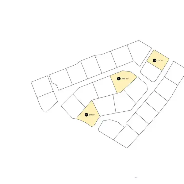 Kortillustration viser tre fremhævede byggegrunde med arealer angivet: to med "952 m²" og en med "1091 m²." Grundene er omgivet af mindre, inddelte områder i et grundenet.