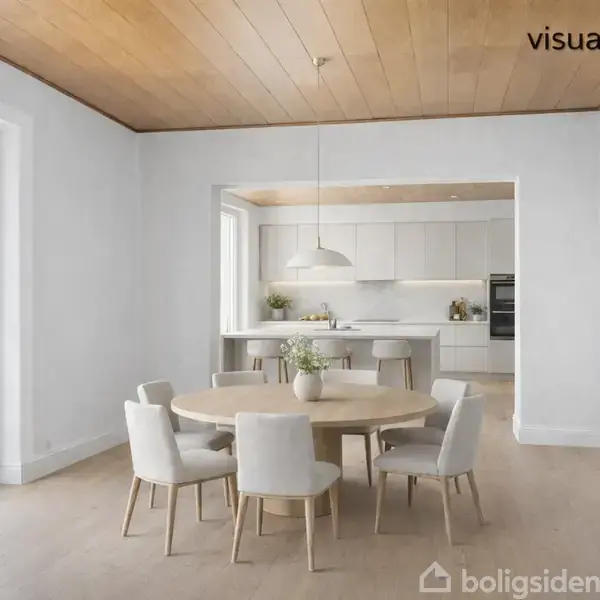 Rundt træbord med seks polstrede stole står i et lyst, moderne spiseområde. I baggrunden er et åbent køkken med hvide skabe og en køkkenø. Øverst står der "visualisering".