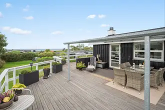 Fritidshus på Nordvangsvej 17, Skovgårde Strand, 8961 Allingåbro