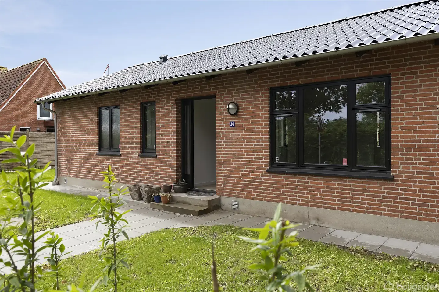 Indflytningsklar villa i Otterup med stor grund og skøn sydvendt terrasse