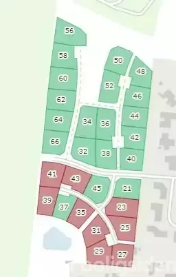 Kort med byggegrunde, hvor numrene 21-42 er markeret i grøn og numrene 23-41 i rød. Området er delt i to zoner med klart adskilte farver.