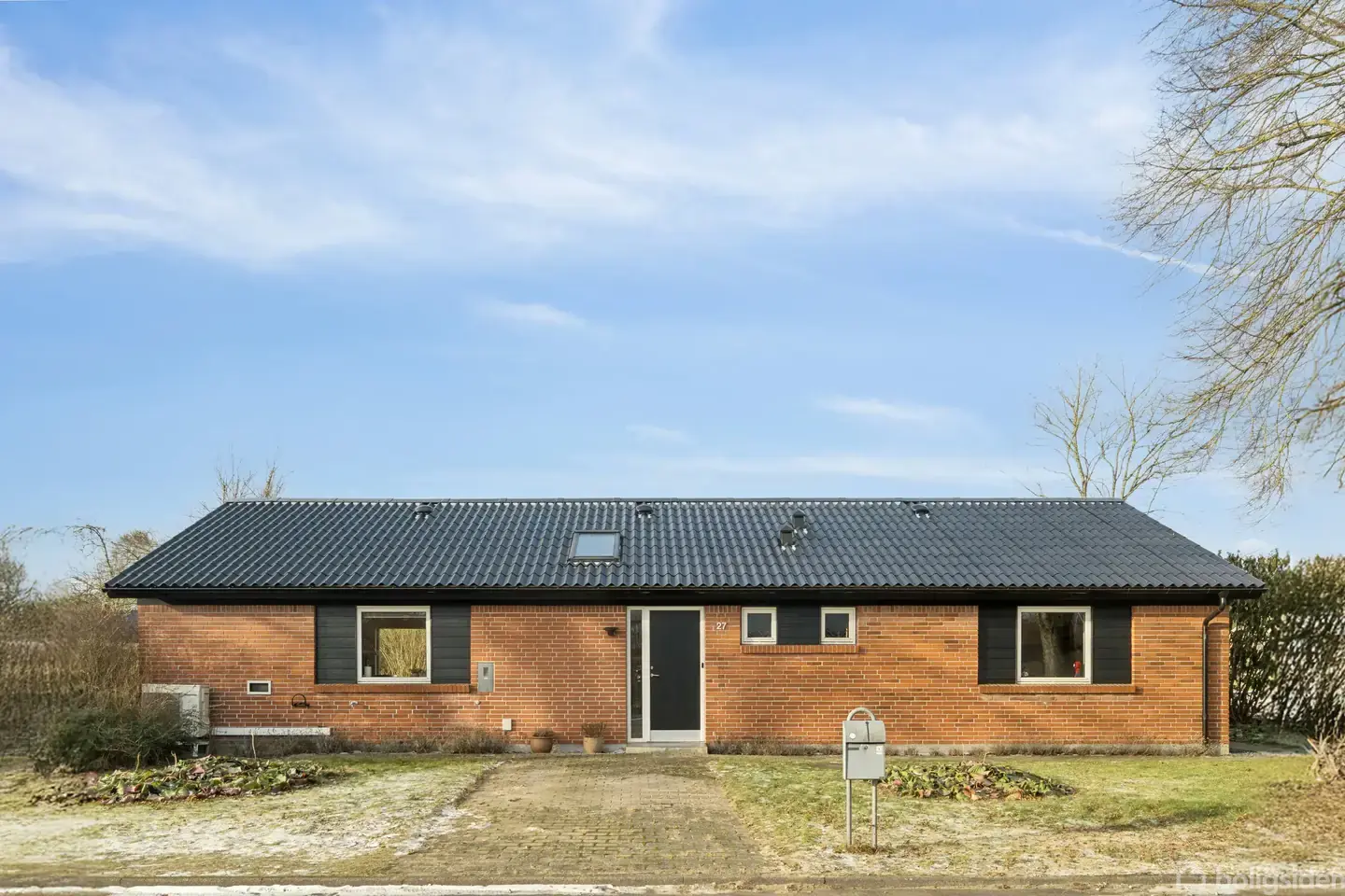 Familievenlig étplansvilla med moderne køkken